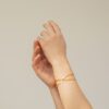 PULSERA DORADA EMBOLIC